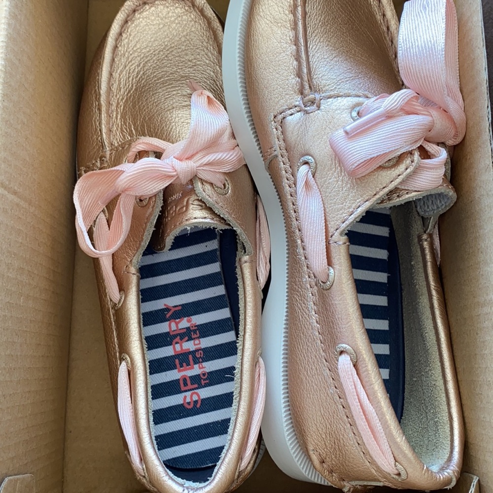 Brand new Michael Kors rose gold girl boat shoes.